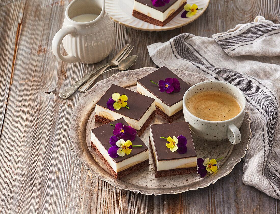 Layered banana cake slices with flowers
