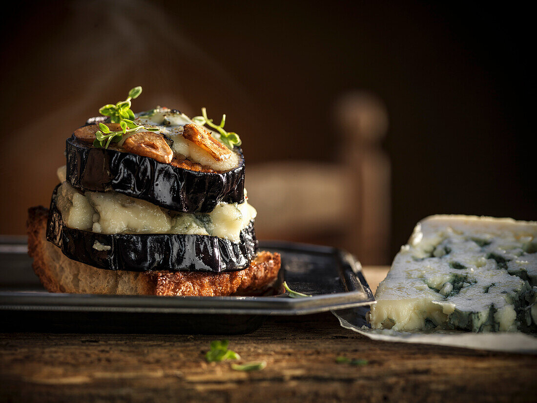 Crostini with eggplant, garlic, and Roquefort cheese