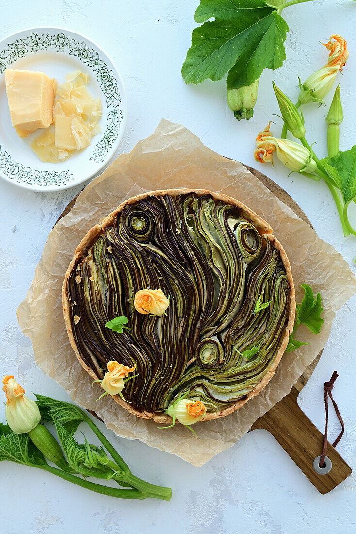 Tarte with zucchini, eggplant, garlic, and herbs