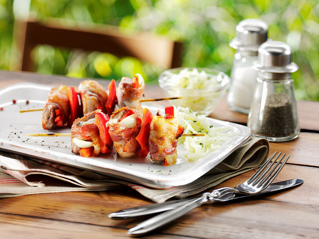 Pork neck steak on a skewer