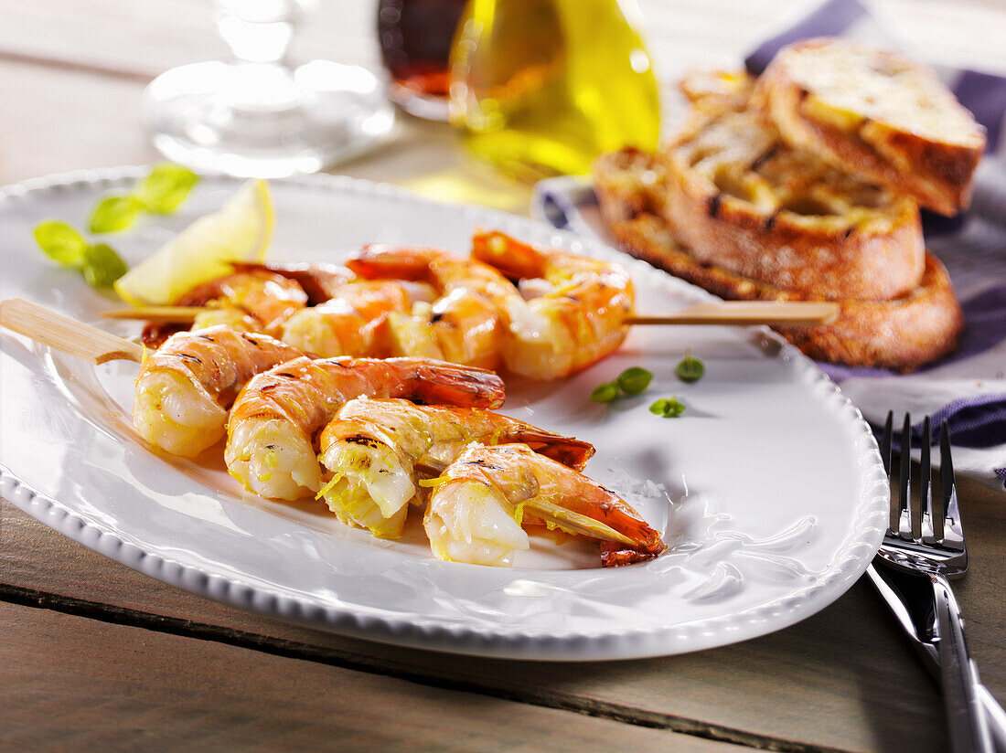 Skewers with marinated king prawns