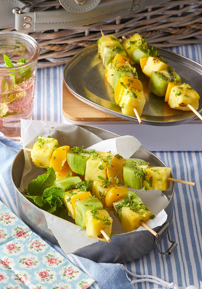 Fruit skewers with kiwi, mango and pineapple