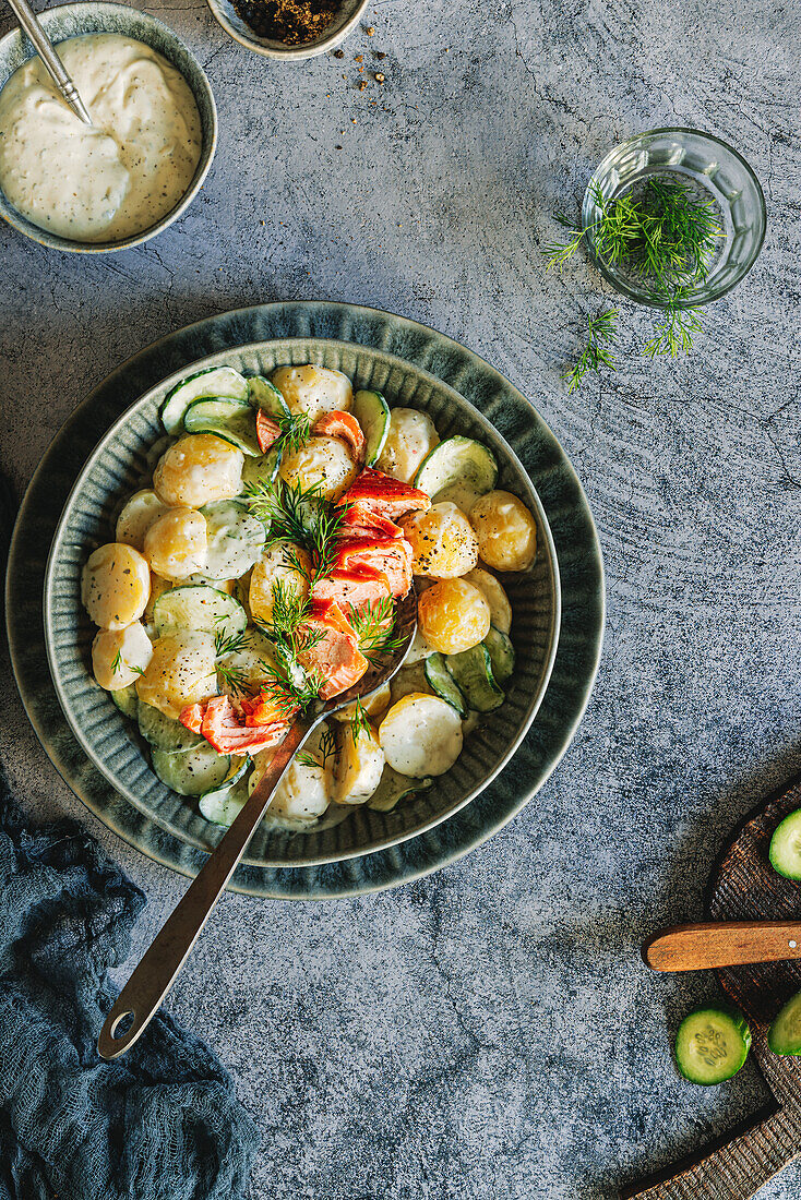 Potato salad with sour cream, dill and salmon