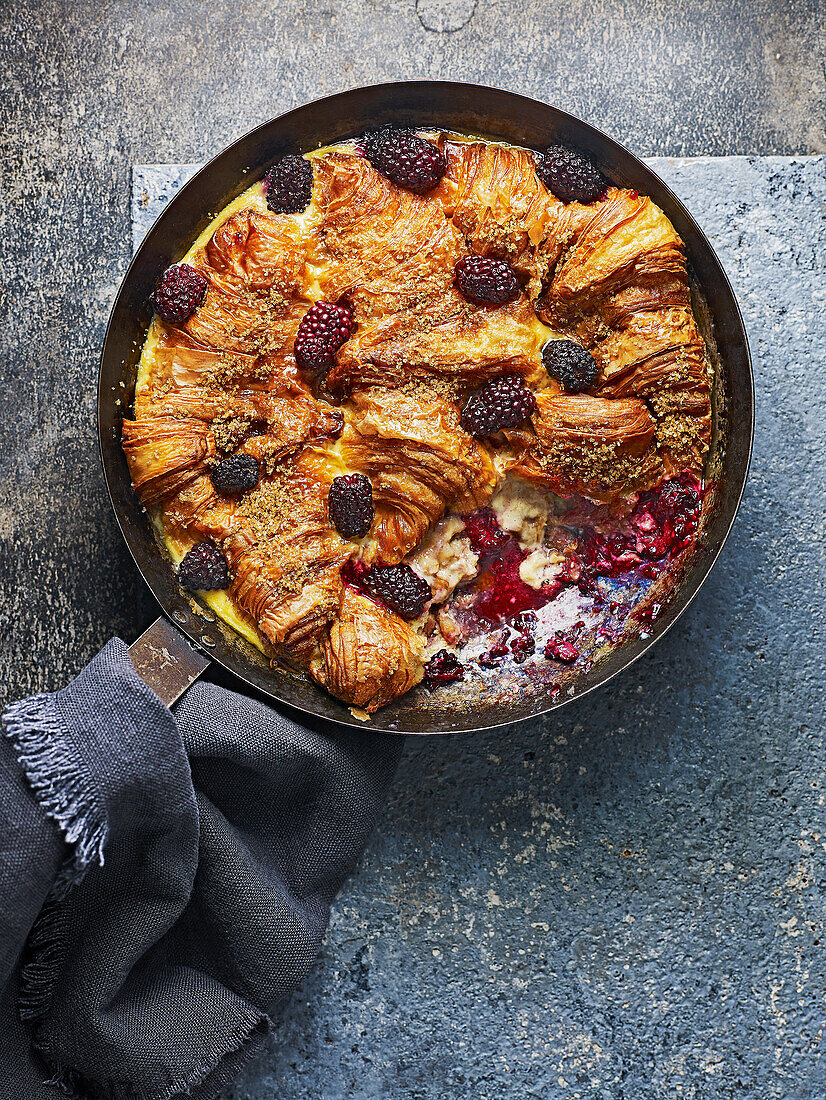 Croissant bread butter pudding with blackberries