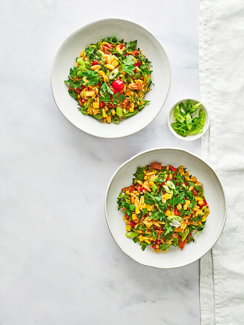 Stew with chorizo, orzo and corn