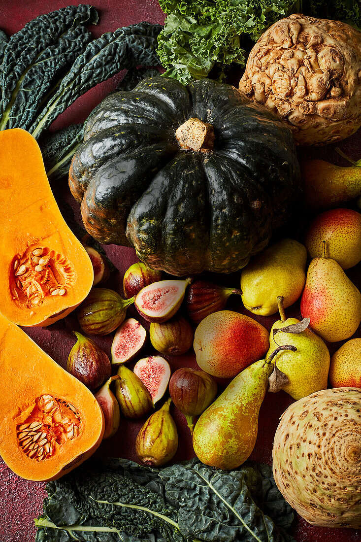 Autumn still life with pumpkin, pears, figs and celeriac