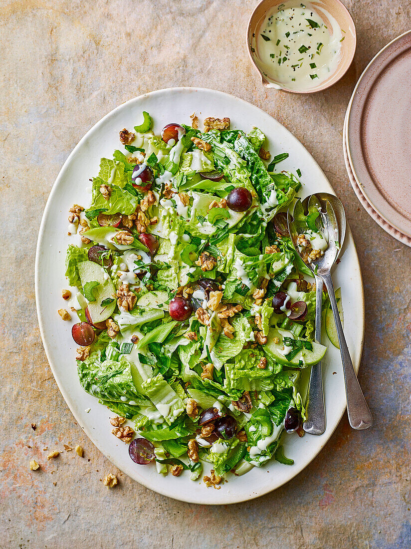 Waldorf salad with red grapes and kale