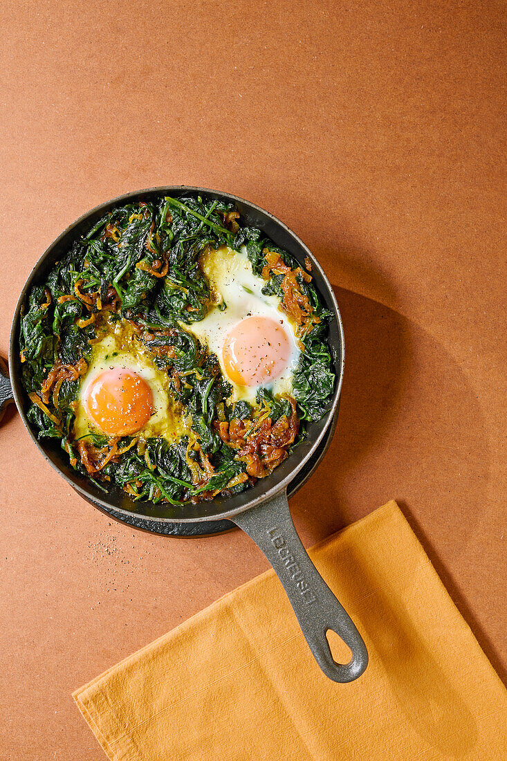 Persian fried eggs with spinach and onions