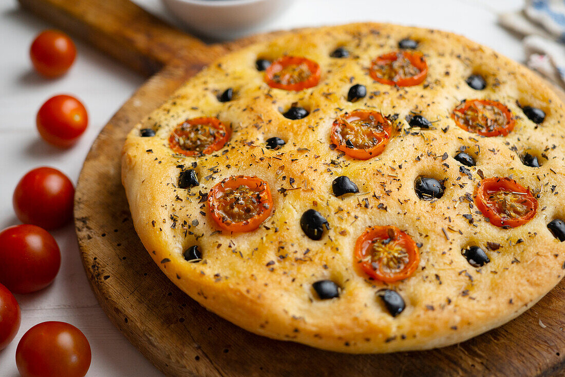 Focaccia with black olives and cherry tomatoes