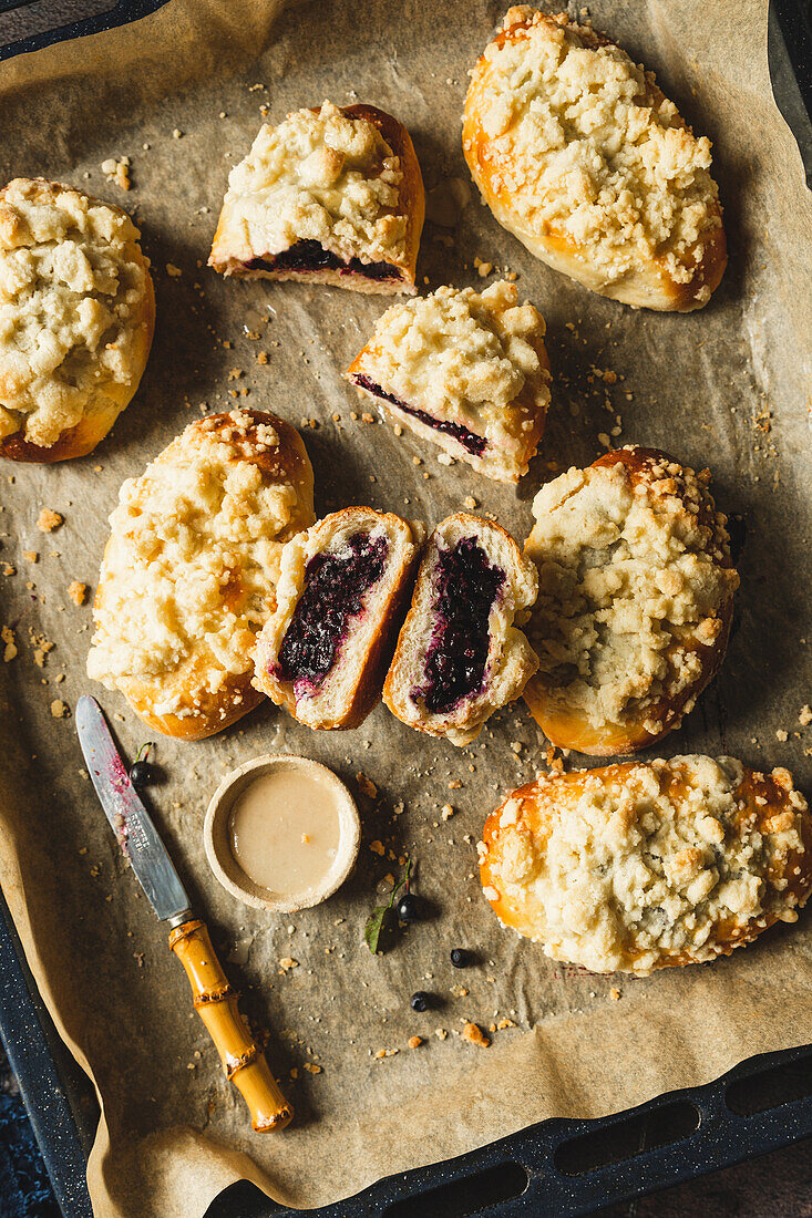 Sweet buns with blueberry filling and crumble