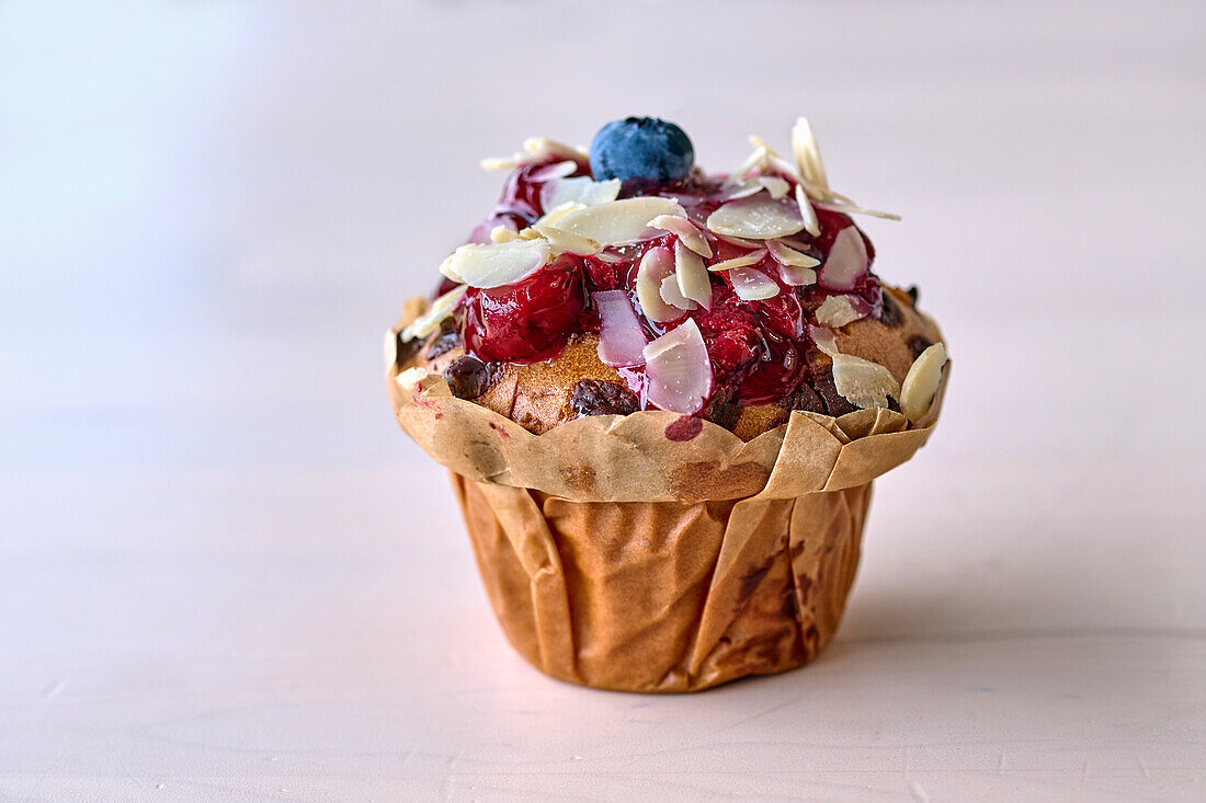 Chocolate muffin with nut and fruit toppings