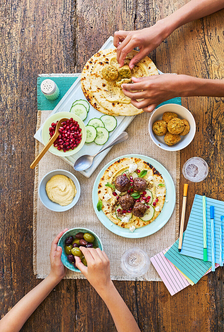 Meze with flatbread, meatballs, falafel, hummus and tzatziki