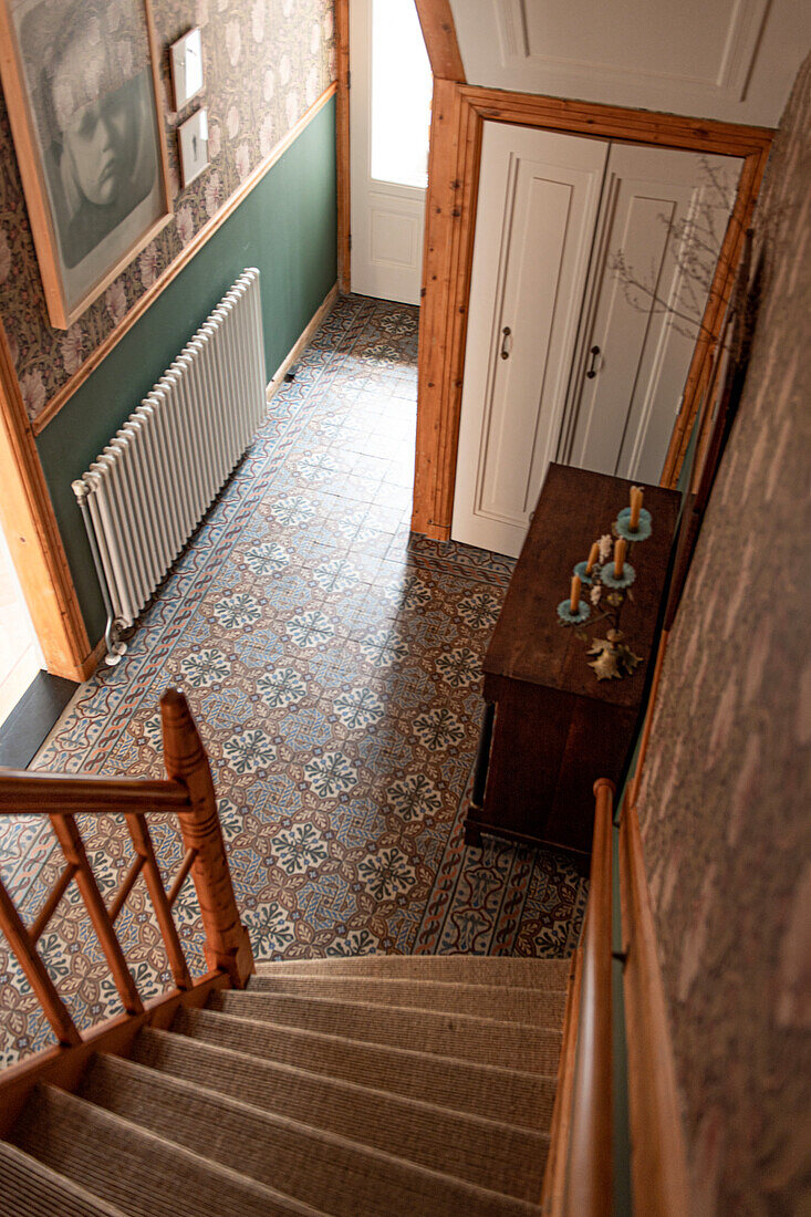 Staircase with patterned floor tiles