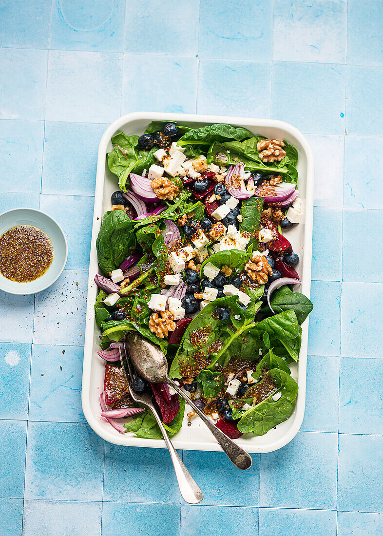 Roasted beet and blueberry salad with feta cheese and walnuts