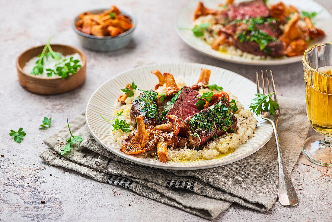 Herbed beef steak with chanterelle risotto