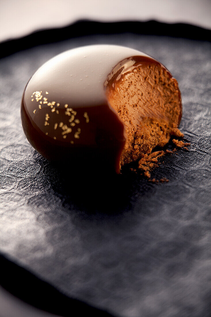 Confectionery with chocolate mousse and gold leaf