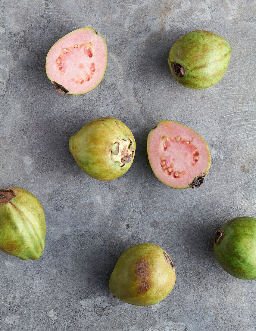 Guavas, whole and halved