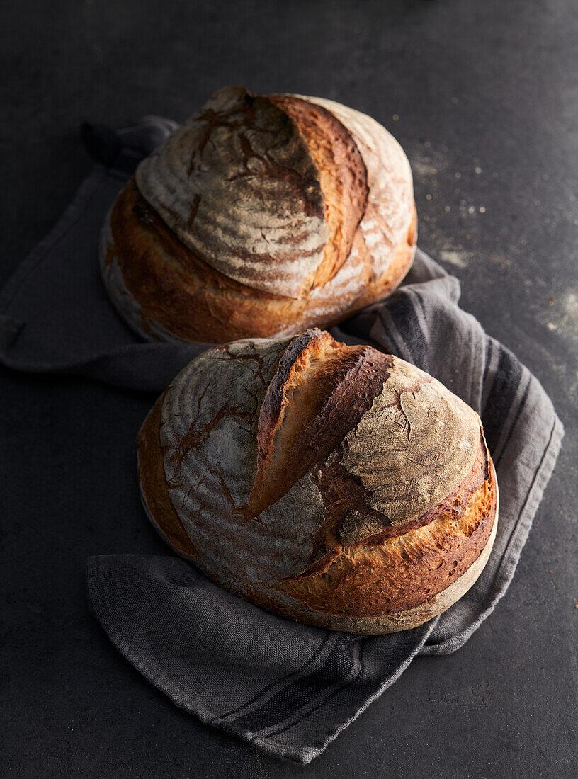 Two farmhouse bread loaves
