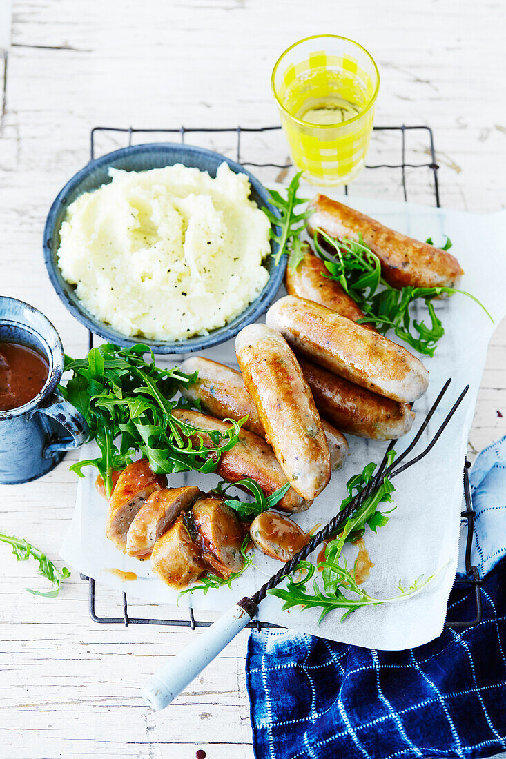 Pork sausages with sage and onion gravy