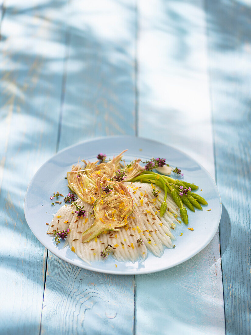 Skate with artichoke and wild asparagus