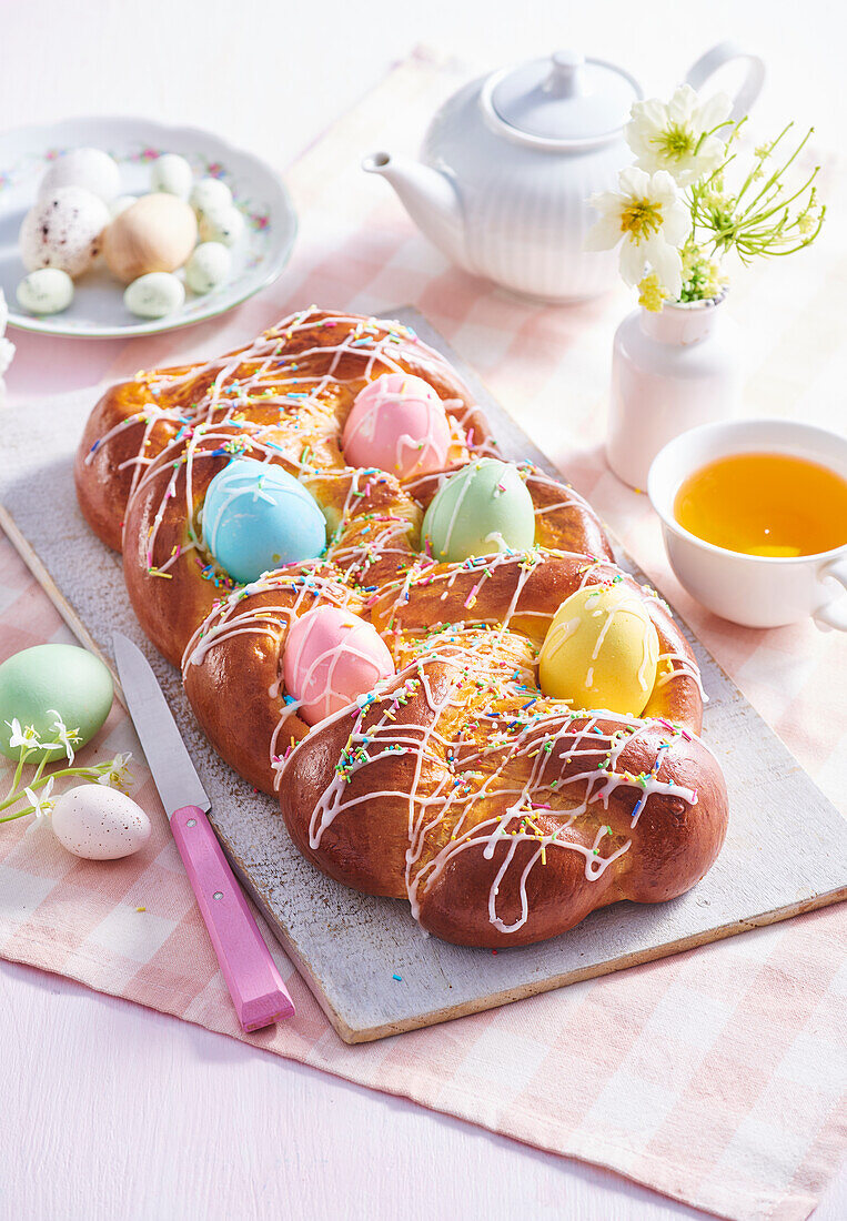 Yeast plait with Easter eggs and icing