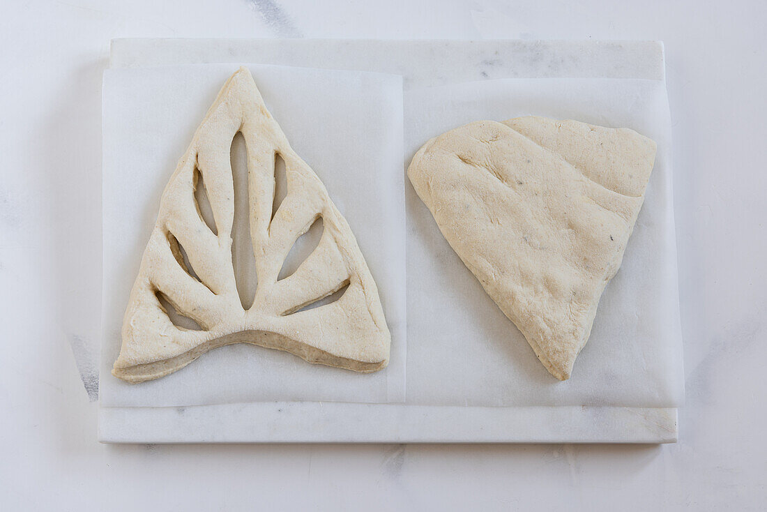 Molded dough pieces for fougasse with rosemary