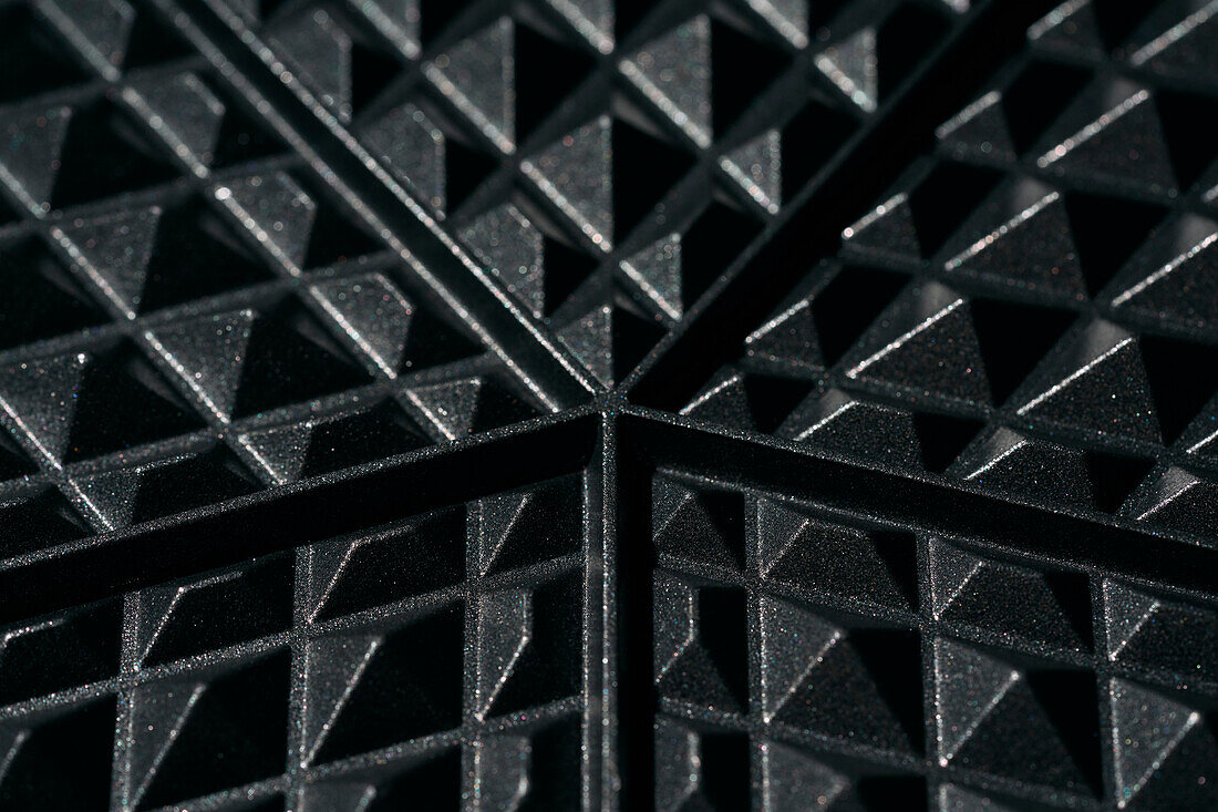 Close up edges and detail of cast iron waffle iron\n