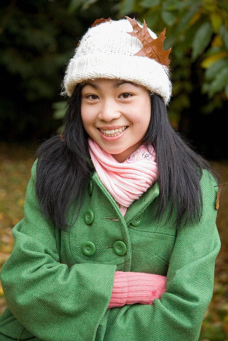 Portrait of young teen with woolly hat\n