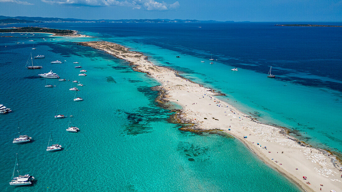 Aerial of the white sand beach of Platja de Ses Illetes, Formentera, Balearic Islands, Spain, Mediterranean, Europe\n