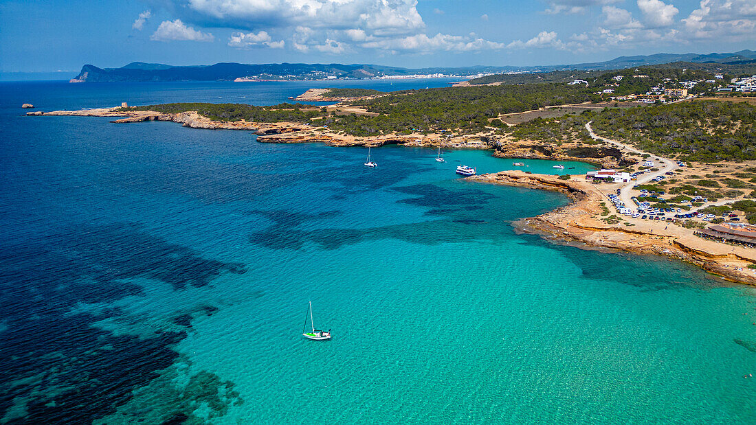 Aerial of Comte beach with its turquoise waters, Ibiza, Balearic Islands, Spain, Mediterranean, Europe\n