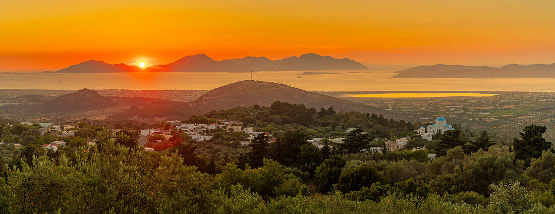 View of Kos Island and Greek Orthodox church from Zia Sunset View at sunset, Zia Village, Kos Town, Kos, Dodecanese, Greek Islands, Greece, Europe\n