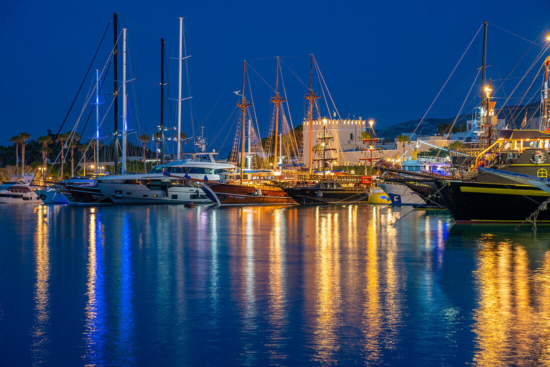 View of the harbour in Kos Town at dusk, Kos, Dodecanese, Greek Islands, Greece, Europe\n
