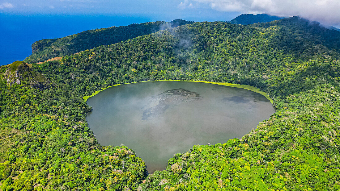 Aerial of the volcanic crater with Lake Mazafim, island of Annobon, Equatorial Guinea, Africa\n