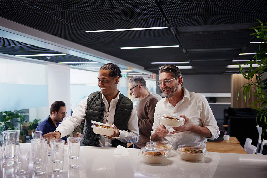 Group of business people during lunch break in office\n