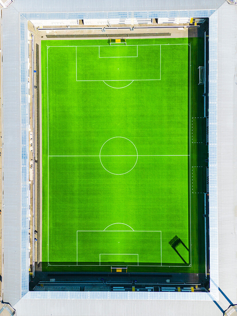 Aerial view of stadium with football pitch\n