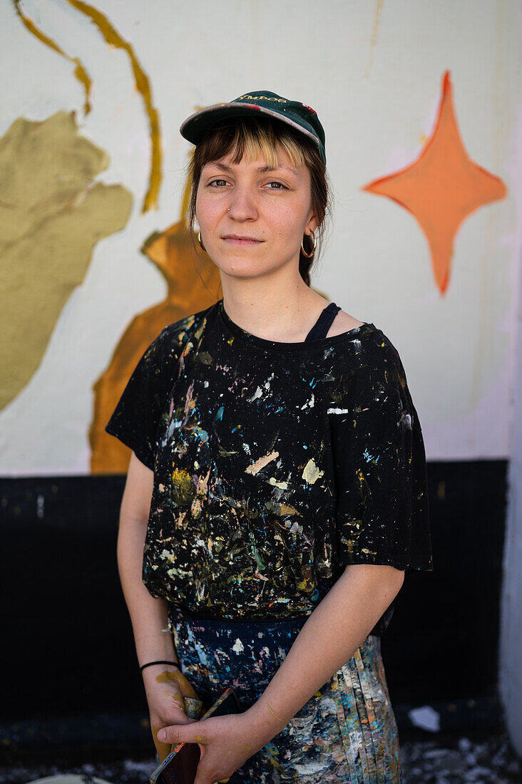 Portrait of Finnish artist Anetta Lukjanova at Asalto International Urban Art Festival in Zaragoza, Spain\n