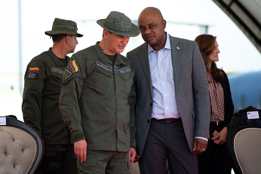 Colombia's national police director General William Rene Salamanca (L) speaks with Colombia's ambassador in the United States Luis Gilberto Murillo (R) during an event at the CATAM - Airbase in Bogota, where the United States of America embassy in Colombia gave 3 Lockheed Martin UH60 Black Hawks to improve the antinarcotics operations, on September 27, 2023.\n