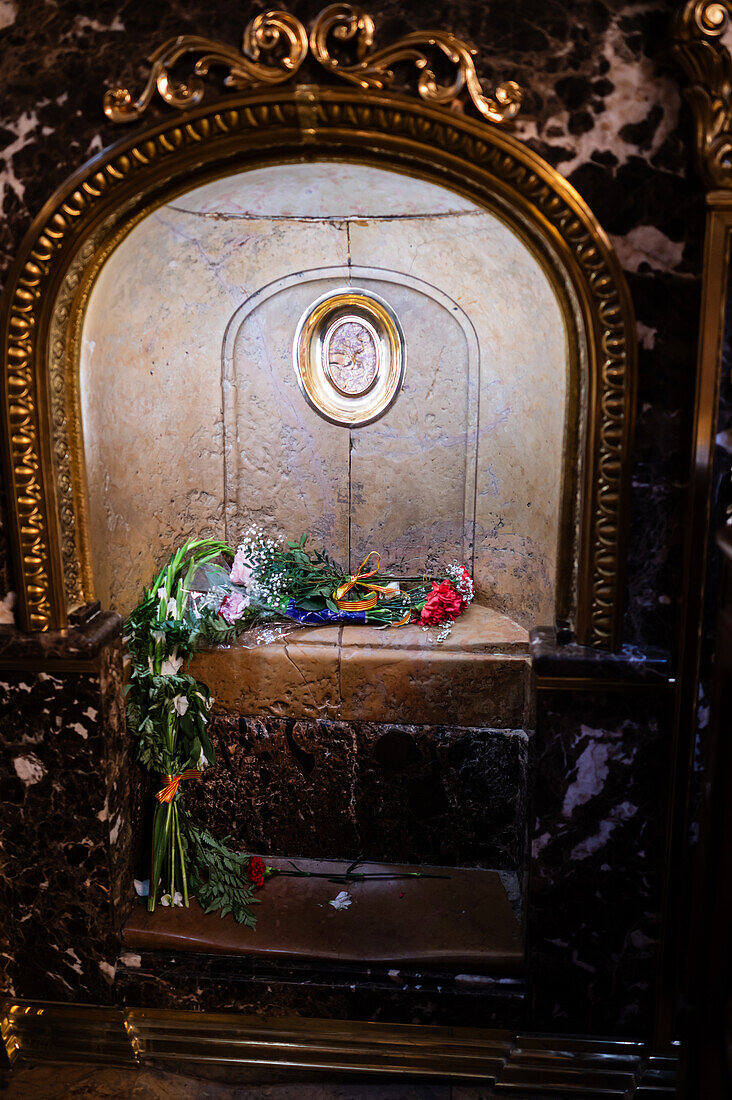 Worshipers kiss this pillar inside the Cathedral-Basilica of Our Lady of the Pillar during The Offering of Flowers to the Virgen del Pilar, the most important and popular event of the Fiestas del Pilar held on Hispanic Day, Zaragoza, Spain\n