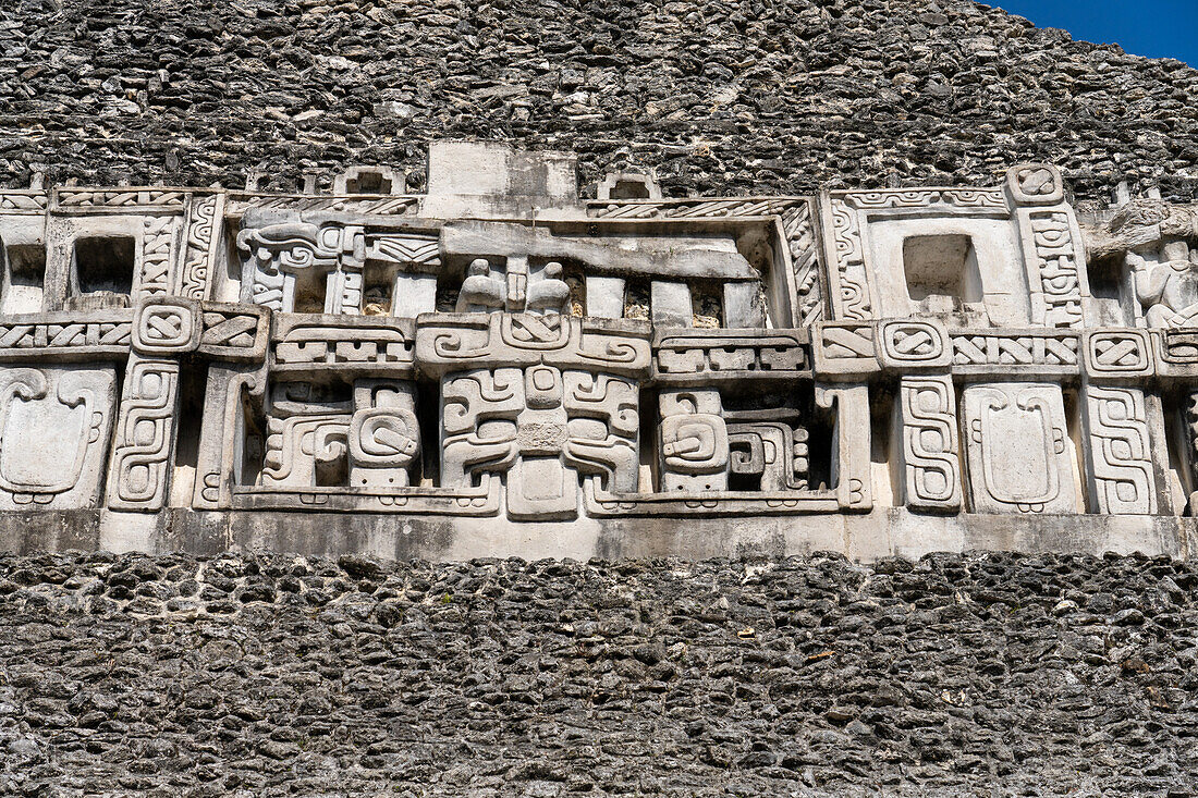 The east frieze on El Castillo or Structure A-6 in the Mayan ruins of the Xunantunich Archeological Reserve in Belize.\n