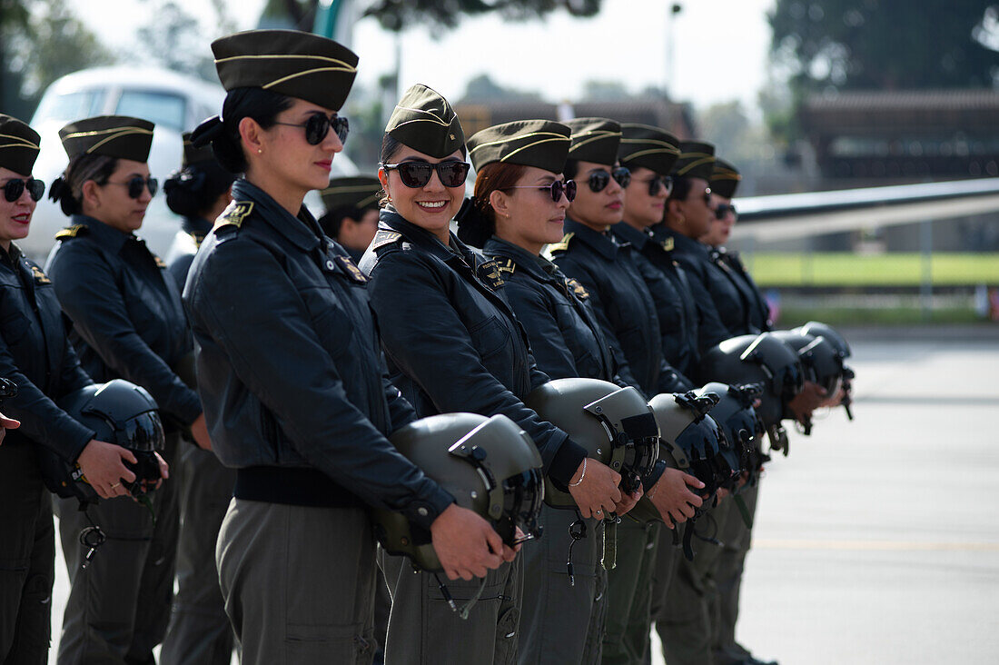 Colombian police helicopter pilots during an event at the CATAM - Airbase in Bogota, where the United States of America embassy in Colombia gave 3 Lockheed Martin UH60 Black Hawks to improve the antinarcotics operations, on September 27, 2023.\n