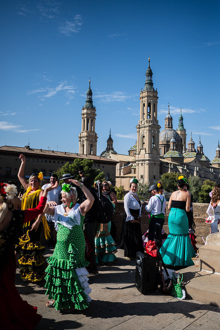 Group from Andalucia dancing sevillanas during The Offering of Fruits on the morning of 13 October during the Fiestas del Pilar, Zaragoza, Aragon, Spain\n