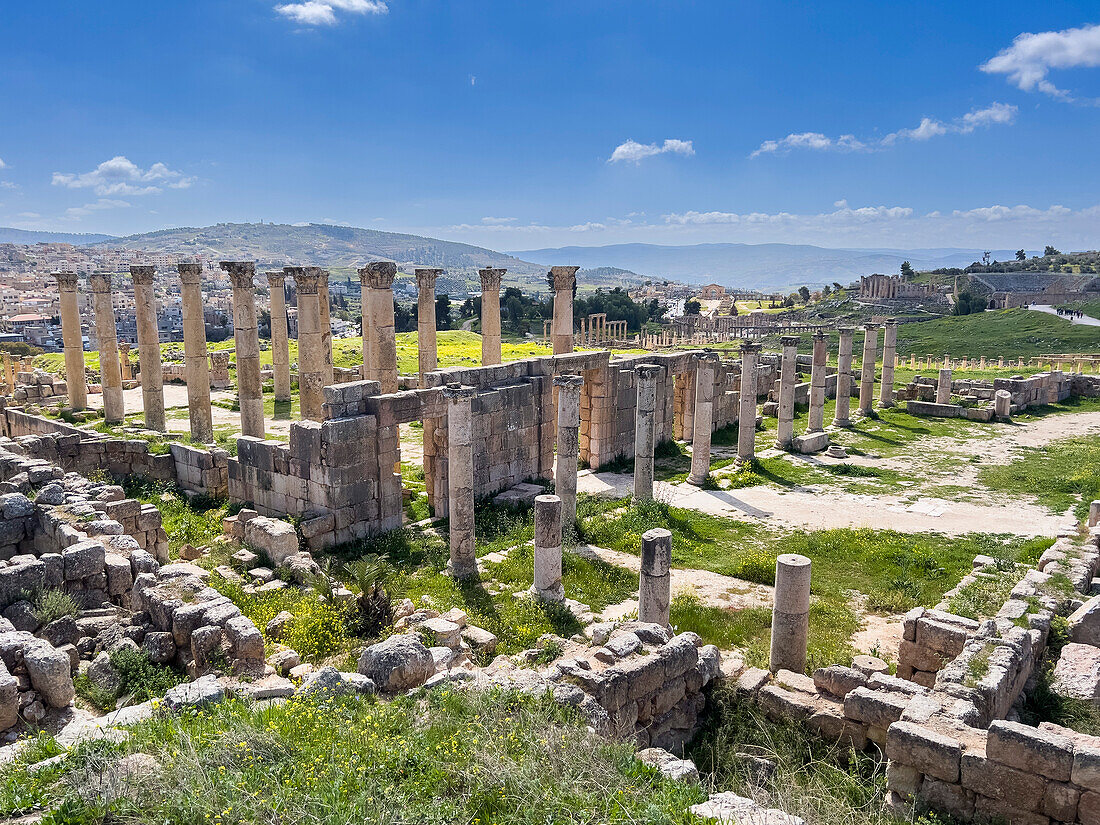 Columns frame a building in the ancient city of Jerash, believed to be founded in 331 BC by Alexander the Great, Jerash, Jordan, Middle East\n