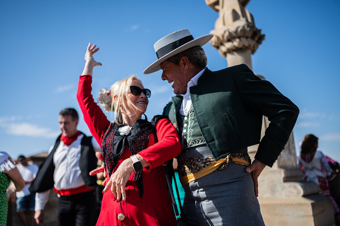 Group from Andalucia dancing sevillanas during The Offering of Fruits on the morning of 13 October during the Fiestas del Pilar, Zaragoza, Aragon, Spain\n