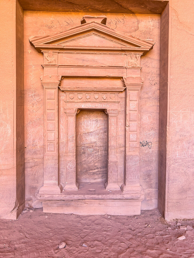 Carved doorway, Petra Archaeological Park, UNESCO World Heritage Site, one of the New Seven Wonders of the World, Petra, Jordan, Middle East\n