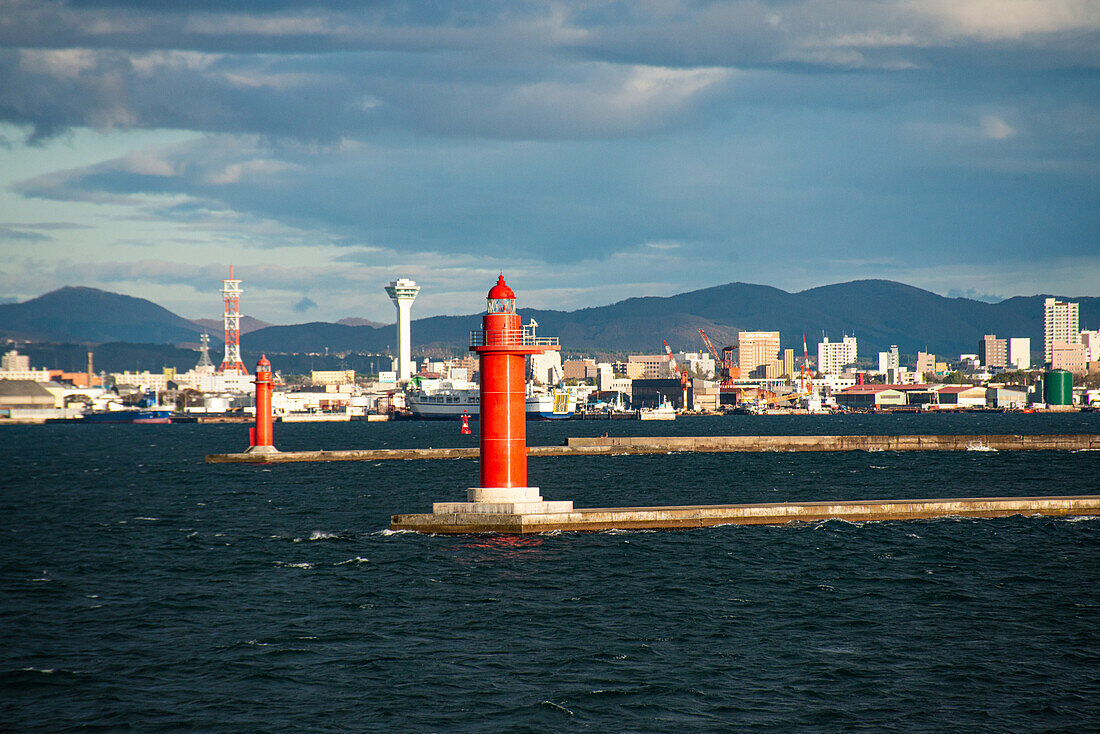 Red lighthouse in front of the harbor of Hakodate, Hokkaido, Japan, Asia\n