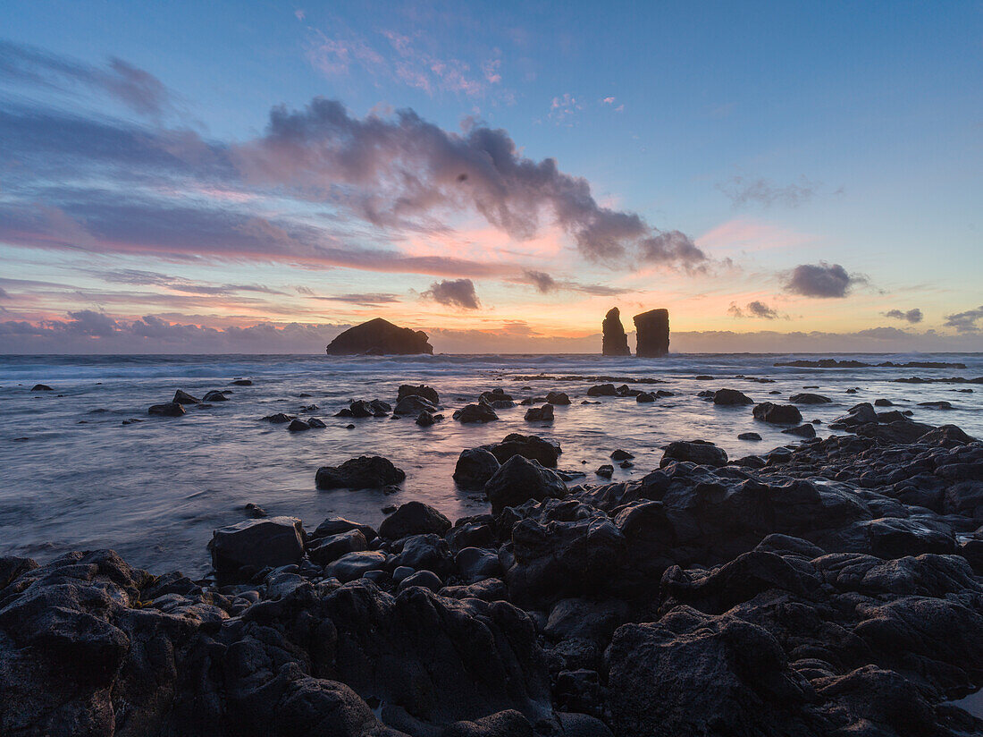 Sunset over the sea stacks of Mosteiros on Sao Miguel Island,Azores Islands, Portugal, Atlantic, Europe\n