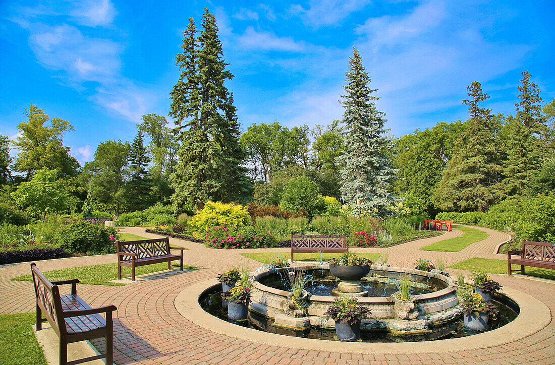 The central fountain in the English Garden in Assiniboine Park, Winnipeg, Manitoba, Canada, North America\n