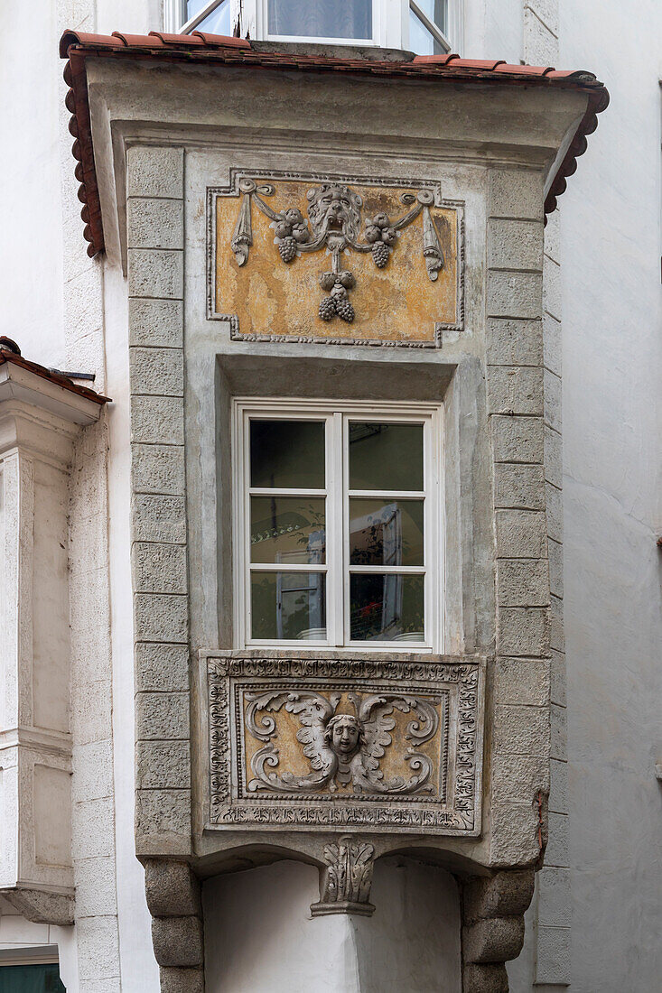 Facade of an ancient house in the old town of Chiusa, Sudtirol (South Tyrol), Bolzano district, Italy, Europe\n