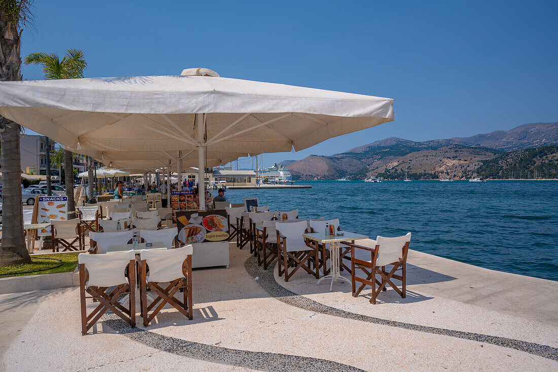 View of restaurant overlooking harbour in Argostoli, capital of Cephalonia, Argostolion, Kefalonia, Ionian Islands, Greek Islands, Greece, Europe\n