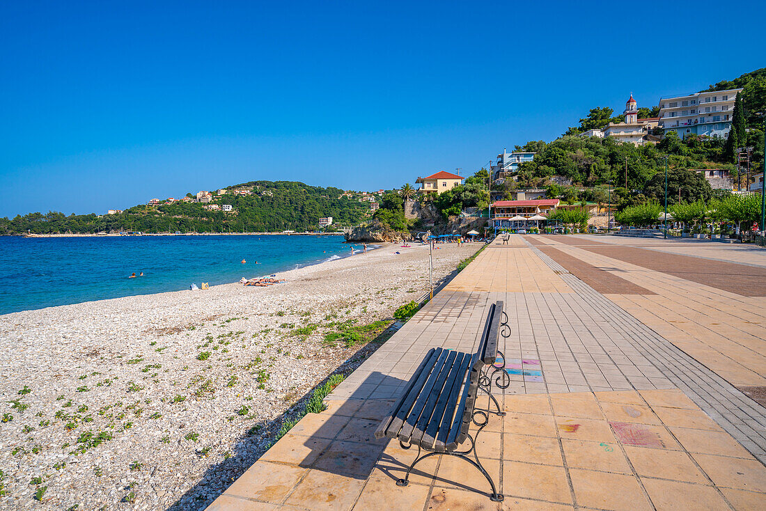 View of beach and promenade in Poros, Poros, Kefalonia, Ionian Islands, Greek Islands, Greece, Europe\n